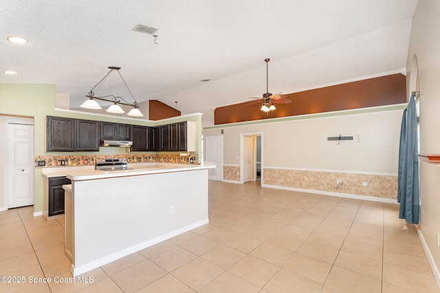 kitchen with a ceiling fan, electric range, visible vents, light tile patterned floors, and light countertops