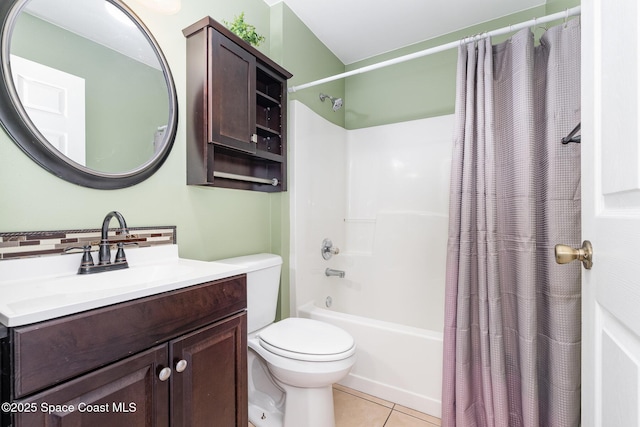 bathroom featuring tile patterned flooring, vanity, shower / bath combination with curtain, toilet, and tasteful backsplash