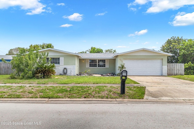 947 Bluewater Dr, Indian Harbour Beach, FL 32937 - single story home with an attached garage, concrete driveway, and brick siding