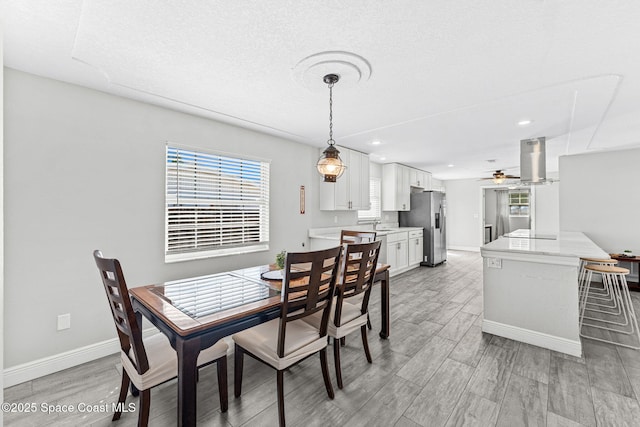 947 Bluewater Dr, Indian Harbour Beach, FL 32937 - dining area with a ceiling fan, light wood-style floors, and recessed lighting