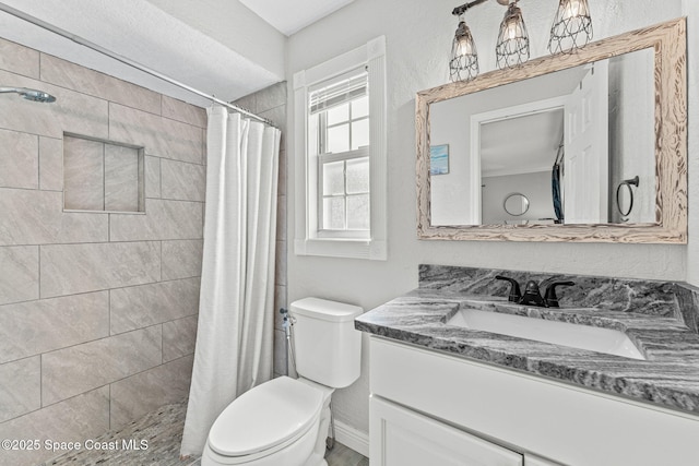 947 Bluewater Dr, Indian Harbour Beach, FL 32937 - bathroom featuring vanity and tiled shower
