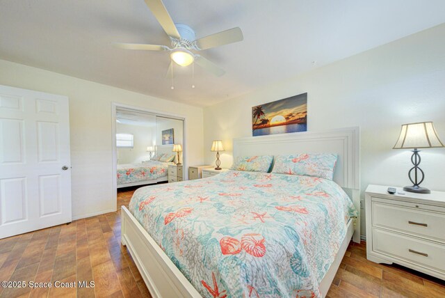 bedroom featuring a closet, a ceiling fan, and wood finished floors