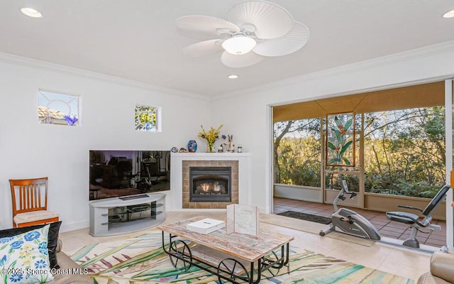 881 Glen Abbey Way, Melbourne, FL 32940 - living area featuring ceiling fan, a fireplace, tile patterned floors, ornamental molding, and recessed lighting