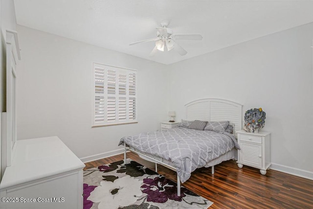 881 Glen Abbey Way, Melbourne, FL 32940 - bedroom featuring baseboards, a ceiling fan, and dark wood-style flooring