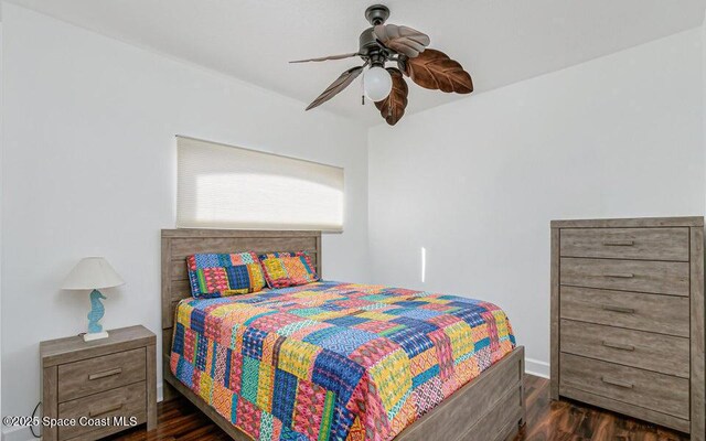 881 Glen Abbey Way, Melbourne, FL 32940 - bedroom featuring baseboards, ceiling fan, and dark wood-style flooring