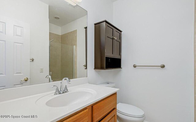 881 Glen Abbey Way, Melbourne, FL 32940 - bathroom with vanity, toilet, and a shower