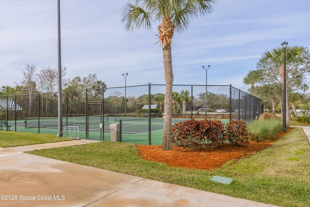 881 Glen Abbey Way, Melbourne, FL 32940 - view of sport court featuring fence