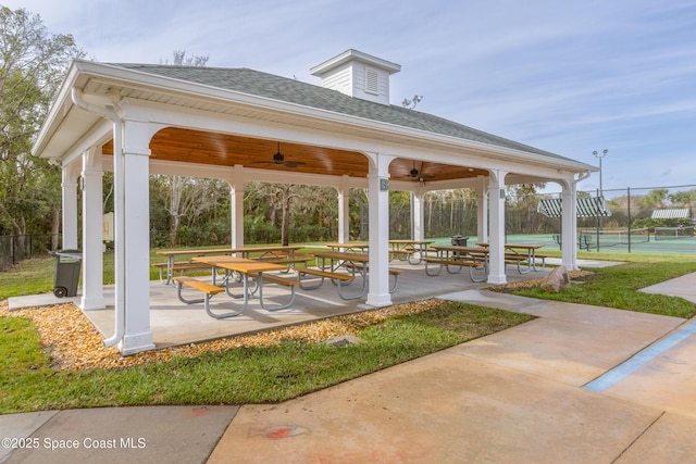 881 Glen Abbey Way, Melbourne, FL 32940 - view of community with a gazebo, fence, and a tennis court