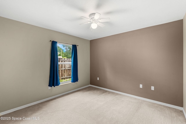 7416 Camio Ave, Cocoa, FL 32927 - carpeted spare room featuring a ceiling fan and baseboards