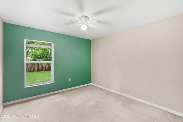 7416 Camio Ave, Cocoa, FL 32927 - carpeted spare room with a ceiling fan and baseboards