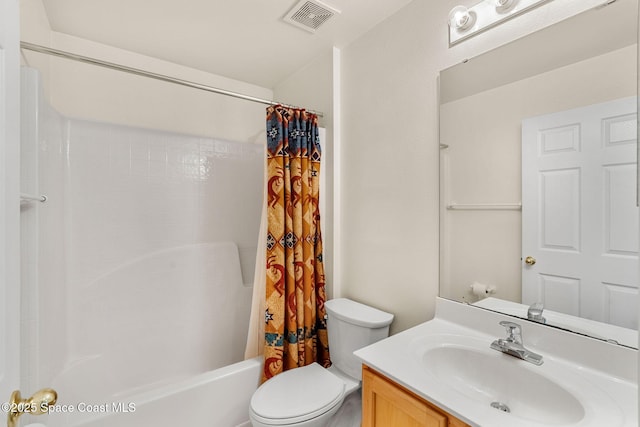 7416 Camio Ave, Cocoa, FL 32927 - full bathroom featuring shower / bath combo, toilet, and vanity