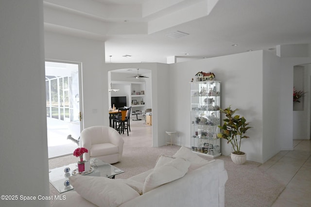 321 Brightwater Dr SE, Palm Bay, FL 32909 - living area with arched walkways and ceiling fan