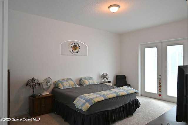 321 Brightwater Dr SE, Palm Bay, FL 32909 - carpeted bedroom featuring access to exterior