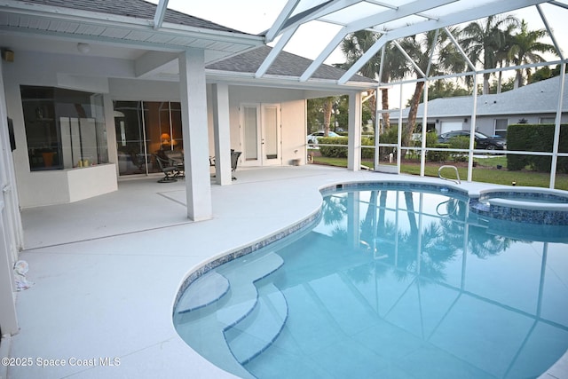 321 Brightwater Dr SE, Palm Bay, FL 32909 - view of pool with a patio, glass enclosure, and a pool with connected hot tub