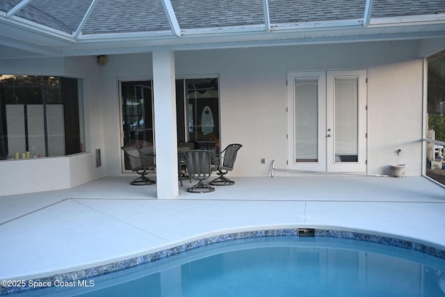 321 Brightwater Dr SE, Palm Bay, FL 32909 - outdoor pool featuring a patio and french doors