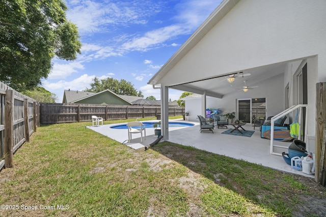 944 Osprey Ln, Rockledge, FL 32955 - view of yard featuring a ceiling fan, a patio, and an outdoor hangout area
