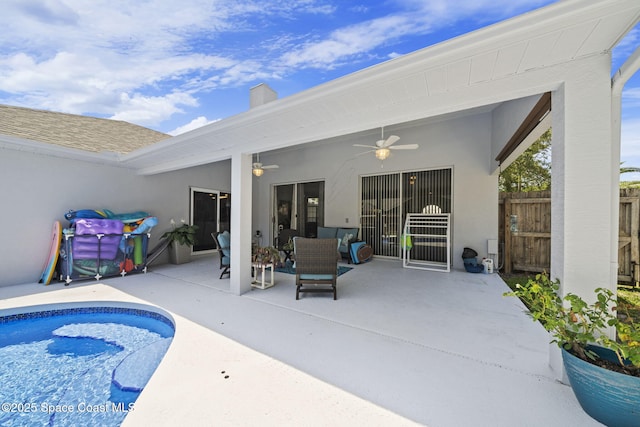 944 Osprey Ln, Rockledge, FL 32955 - swimming pool featuring a ceiling fan, a patio, and fence