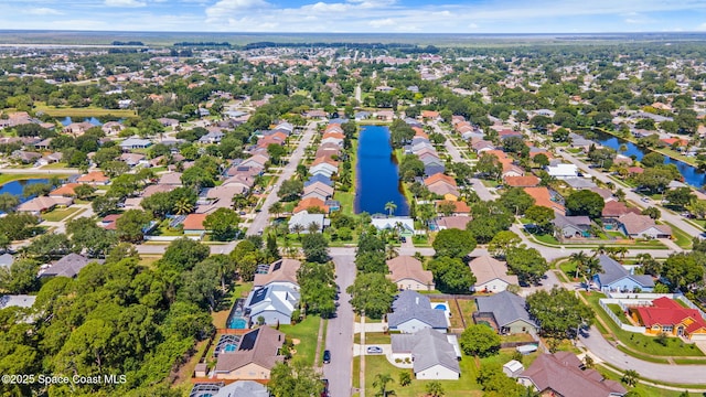 944 Osprey Ln, Rockledge, FL 32955 - aerial view of residential area with a large body of water