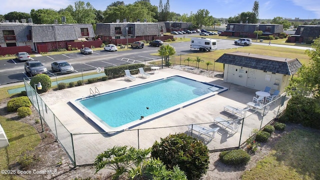 pool featuring fence