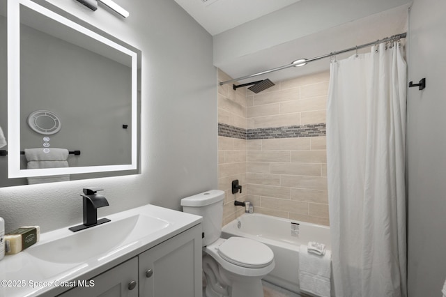 full bathroom featuring vanity, toilet, and shower / tub combo