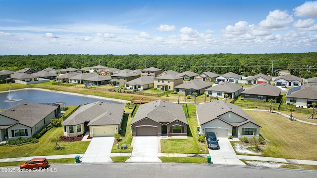 aerial perspective of suburban area with a heavily wooded area
