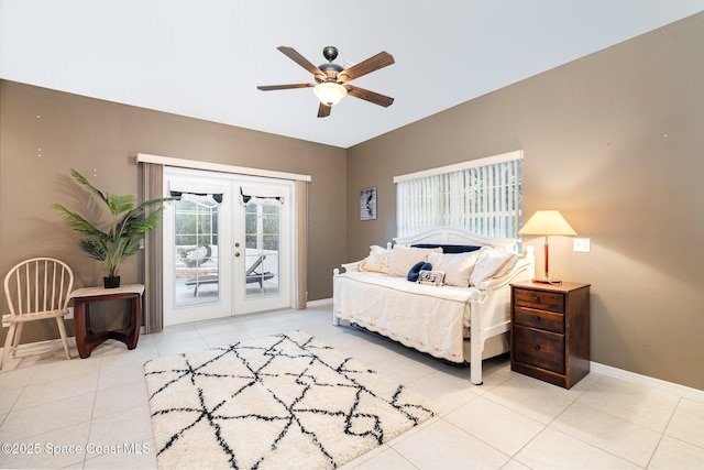 7703 Windover Way, Titusville, FL 32780 - tiled bedroom with access to outside, a ceiling fan, baseboards, and french doors