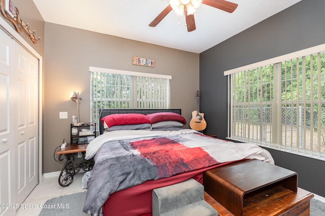 7703 Windover Way, Titusville, FL 32780 - carpeted bedroom featuring baseboards and a ceiling fan