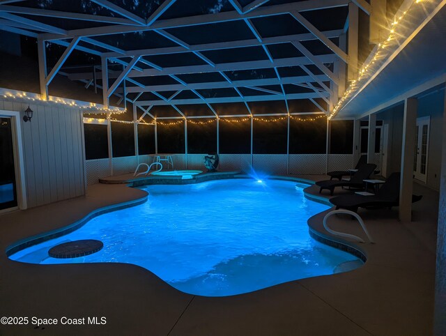 7703 Windover Way, Titusville, FL 32780 - outdoor pool featuring a patio, an in ground hot tub, and a lanai