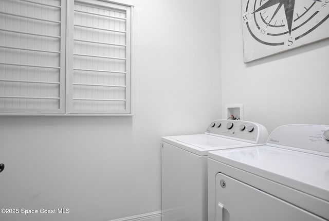 laundry room featuring laundry area and separate washer and dryer