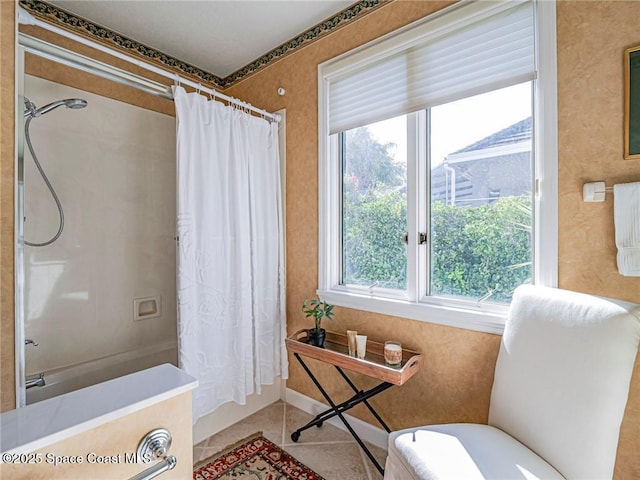 120 N White Jewel Ct, Vero Beach, FL 32963 - bathroom featuring tile patterned flooring and shower / bath combo with shower curtain
