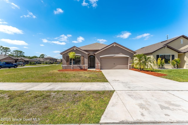 5985 Orsino Ln, Cocoa, FL 32926 - view of front facade featuring stucco siding, driveway, a garage, and a front yard