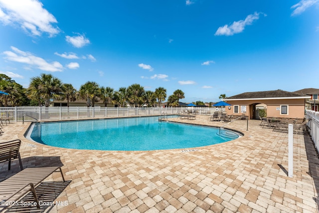 5985 Orsino Ln, Cocoa, FL 32926 - community pool with fence and a patio area