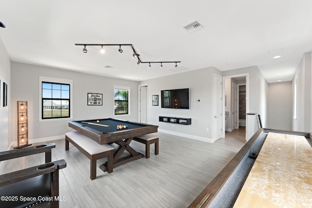 7773 Desmond Ave, Melbourne, FL 32940 - rec room with pool table, baseboards, and rail lighting