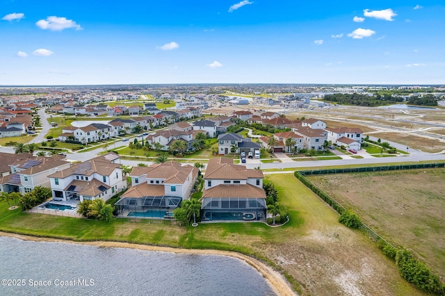 7773 Desmond Ave, Melbourne, FL 32940 - aerial view of residential area featuring a large body of water