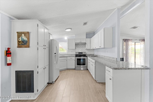 8865 Central Ave, Micco, FL 32976 - kitchen with electric stove, white refrigerator with ice dispenser, healthy amount of natural light, a peninsula, and crown molding