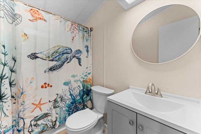 8865 Central Ave, Micco, FL 32976 - bathroom with toilet, vanity, and a shower with shower curtain