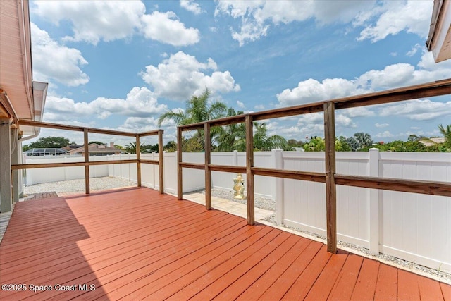 8865 Central Ave, Micco, FL 32976 - wooden deck with a fenced backyard