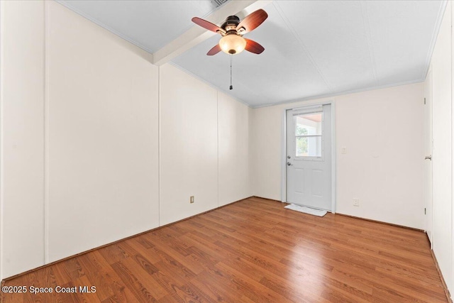 8865 Central Ave, Micco, FL 32976 - unfurnished room featuring wood finished floors, a ceiling fan, and crown molding