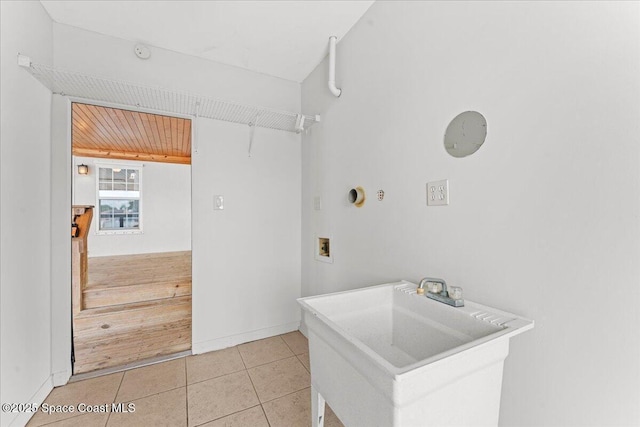 8865 Central Ave, Micco, FL 32976 - clothes washing area with washer hookup, light tile patterned flooring, baseboards, and wooden ceiling