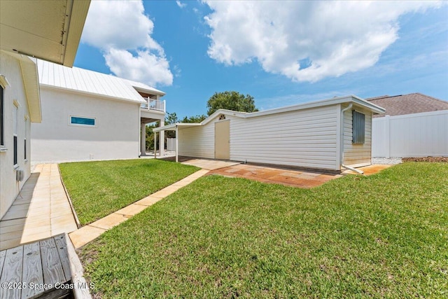 8865 Central Ave, Micco, FL 32976 - view of yard featuring a patio and a balcony