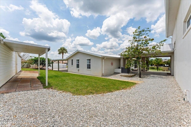 8865 Central Ave, Micco, FL 32976 - back of property featuring stucco siding
