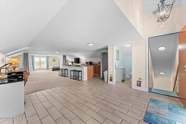 8865 Central Ave, Micco, FL 32976 - foyer entrance featuring lofted ceiling, baseboards, and recessed lighting