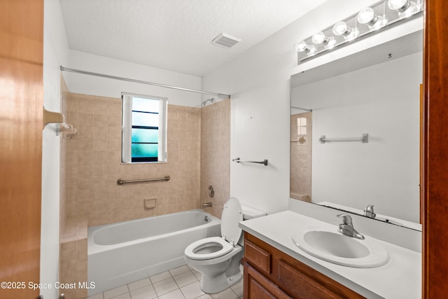full bathroom featuring toilet, visible vents, tile patterned floors, vanity, and shower / washtub combination