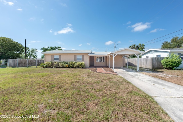 ranch-style house featuring stucco siding, a front lawn, fence, and driveway