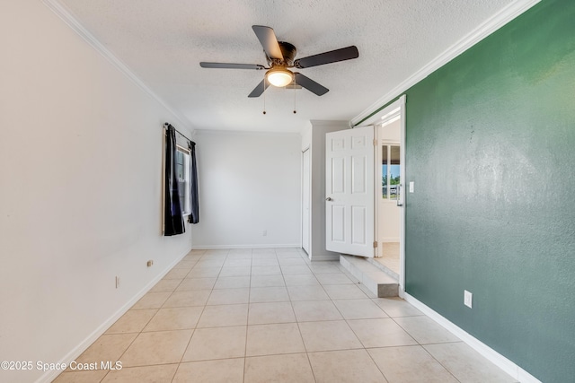 unfurnished room with a textured ceiling, ornamental molding, and ceiling fan