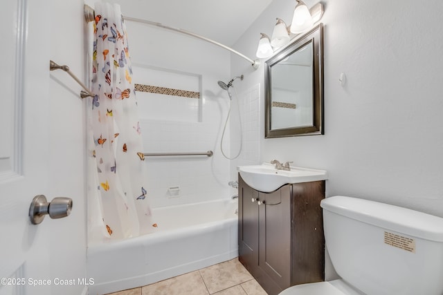bathroom with vanity, tile patterned floors, toilet, and shower / tub combo with curtain