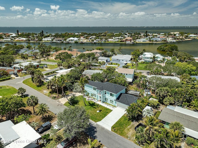 aerial view featuring a water view and a residential view