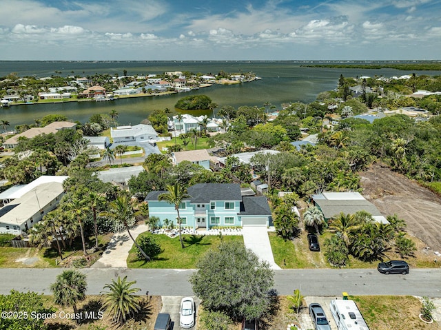 aerial view with a water view and a residential view
