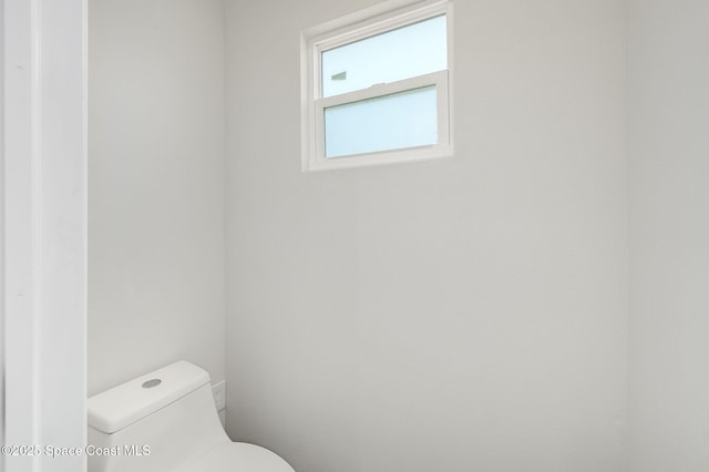bathroom featuring toilet