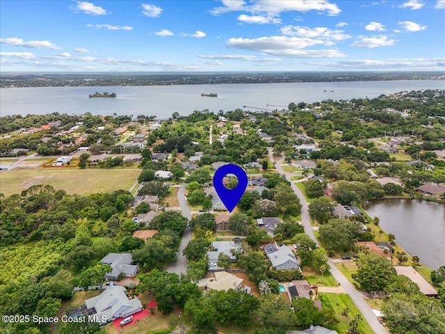 bird's eye view with a water view and a residential view